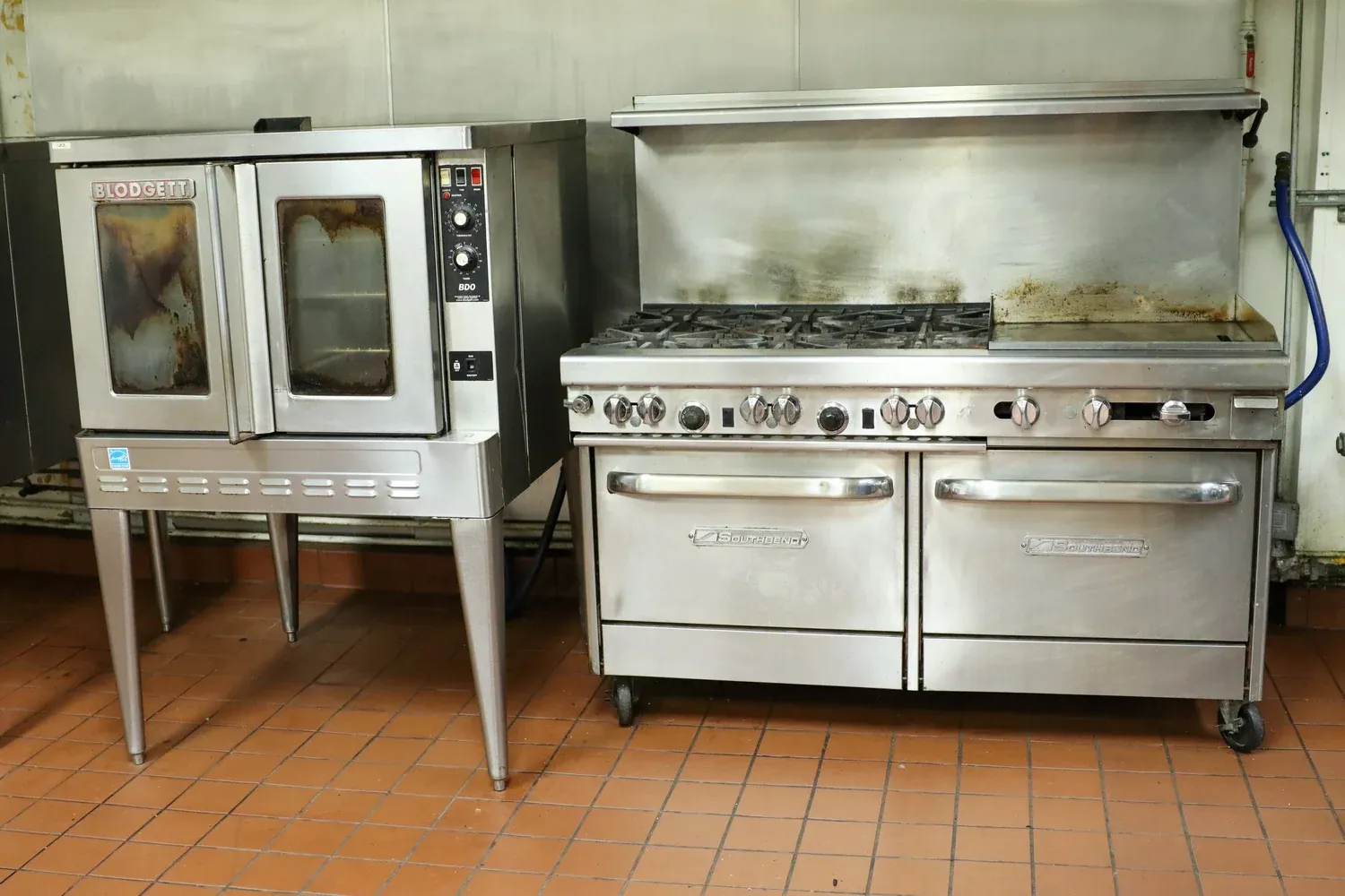 Convection ovens next to a gas range
